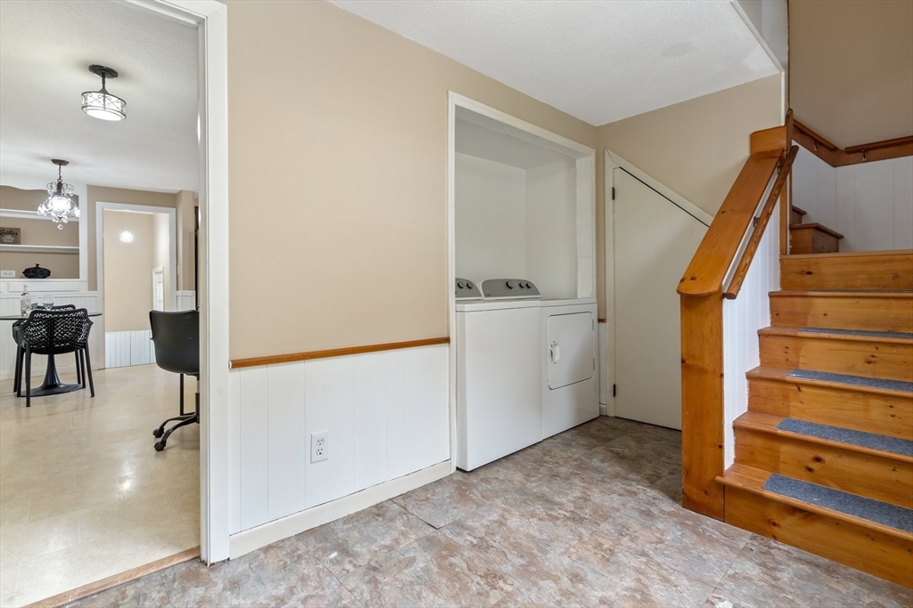 74 County Road East Freetown, MA 02717 - Photo 29 of 40 a view of hallway with stairs and wooden floor
