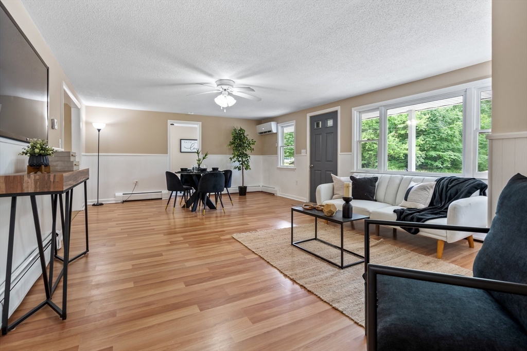 74 County Road East Freetown, MA 02717 - Photo 3 of 40 a living room with furniture and a wooden floor