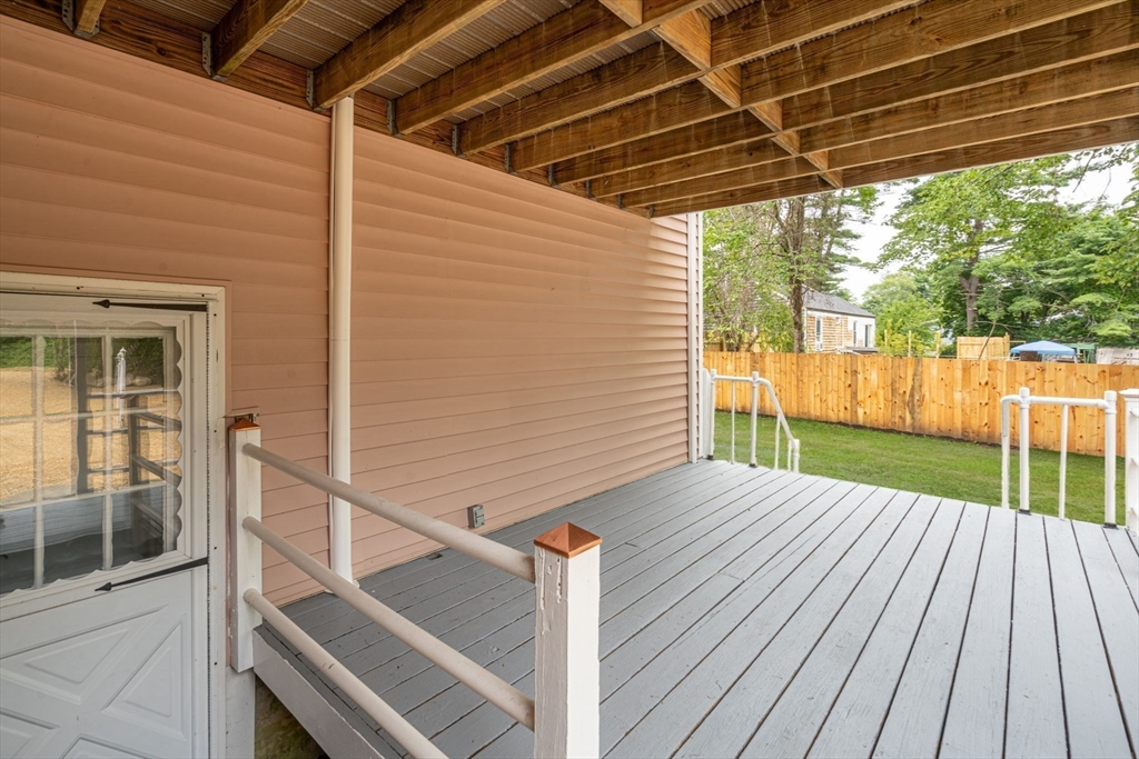 74 County Road East Freetown, MA 02717 - Photo 32 of 40 a view of backyard with deck and wooden floor