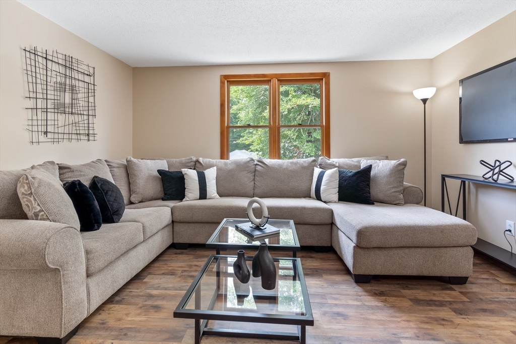 74 County Road East Freetown, MA 02717 - Photo 4 of 40 a living room with furniture and a large window