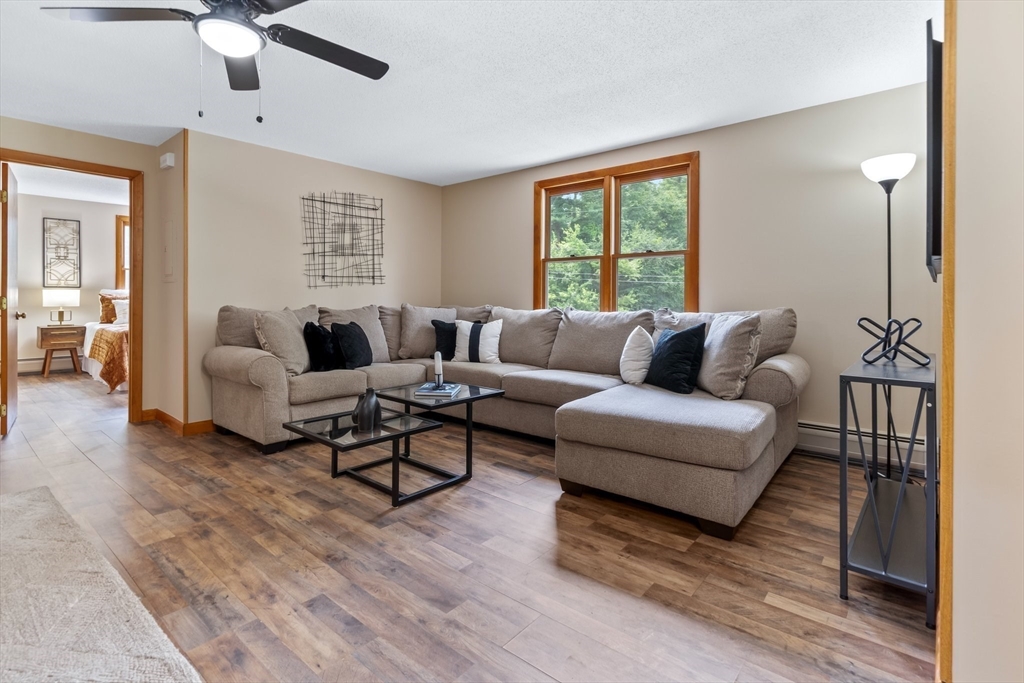 74 County Road East Freetown, MA 02717 - Photo 5 of 40 a living room with furniture and a large window