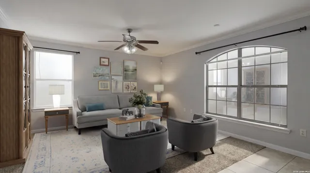 a living room with furniture and a window