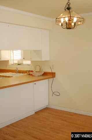 15450 Kivett Lane Reno, NV 89521 - Photo 5 of 9 a view of a room with rack and wooden floor