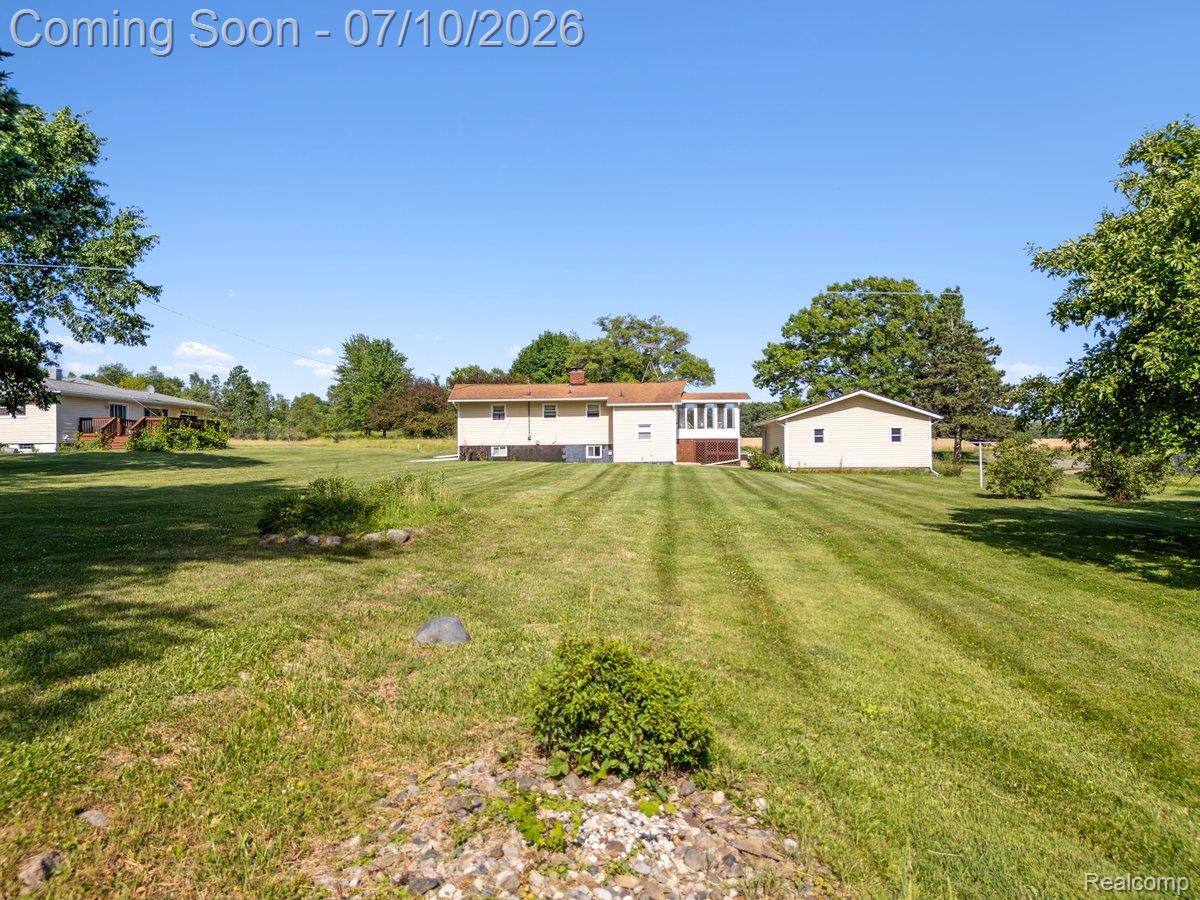 3381 North Fleming Road Fowlerville, MI 48836 - Photo 12 of 29 Back of home and yard