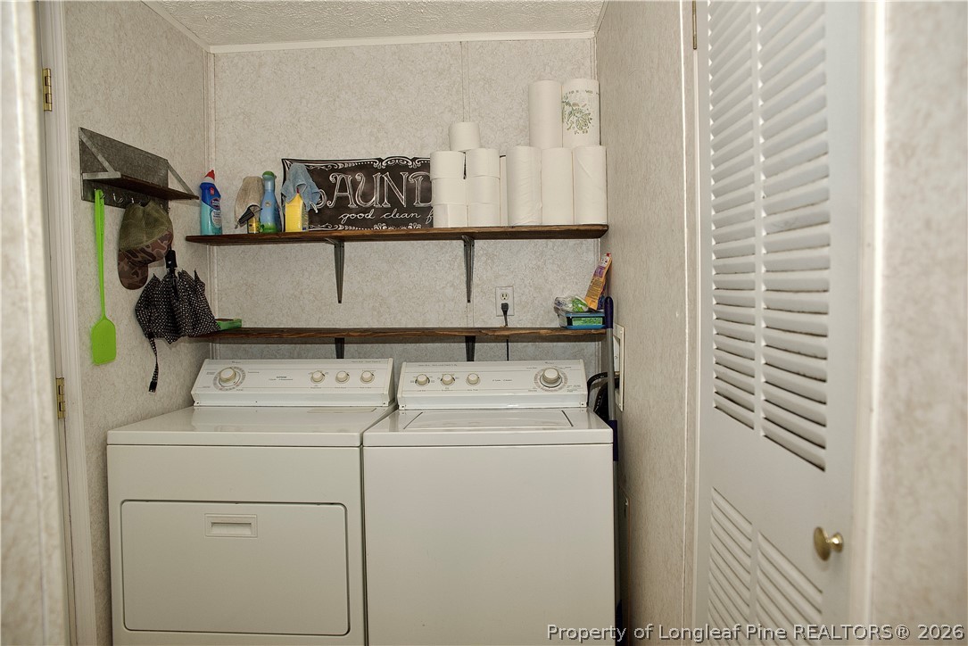 1071 Watts Road Lumberton, NC 28360 - Photo 27 of 31 a utility room with dryer and washer