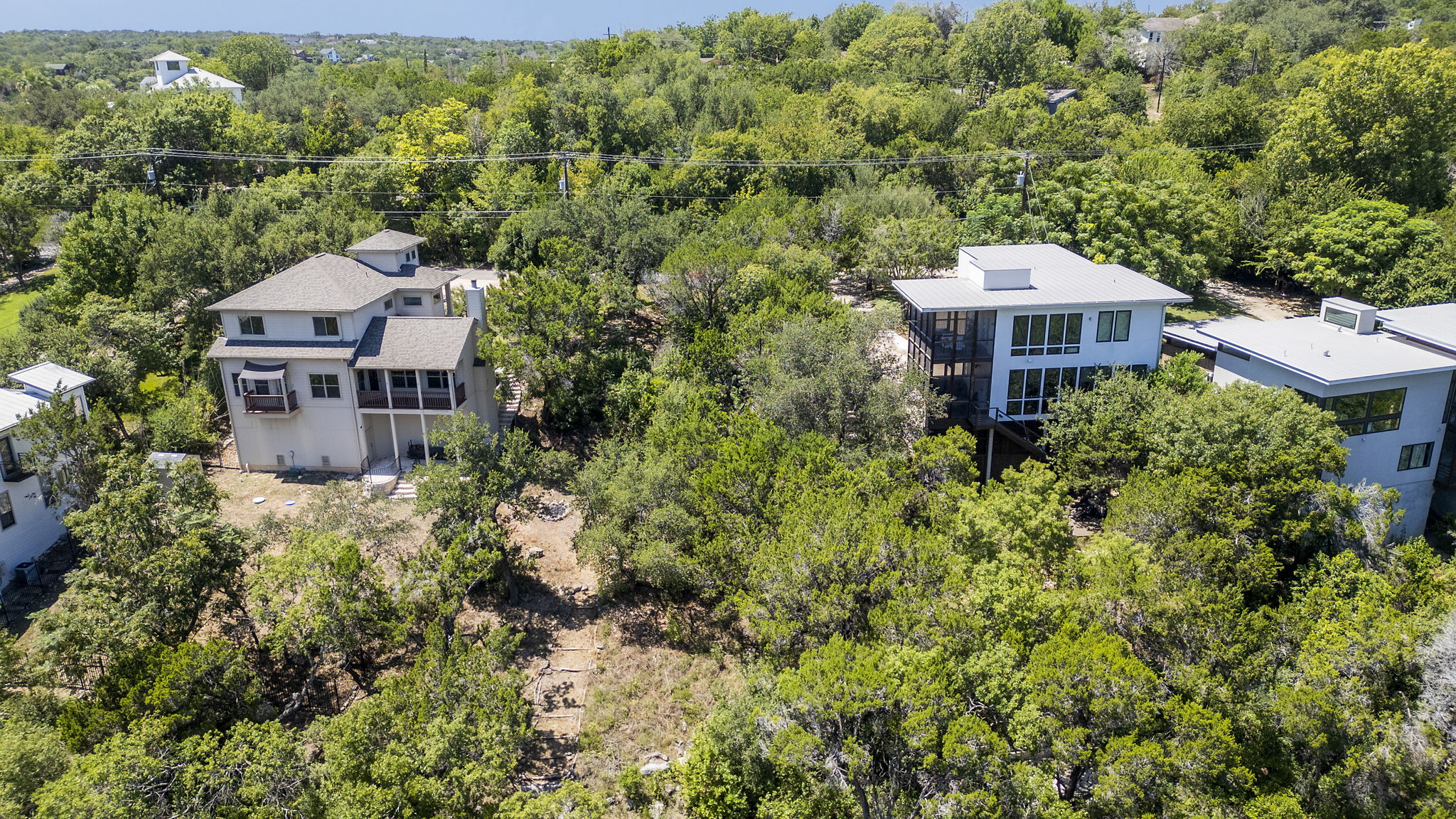 3013 Geronimo Trail Austin, TX 78734 - Photo 6 of 20 an aerial view of a house with a yard basket ball court and outdoor seating
