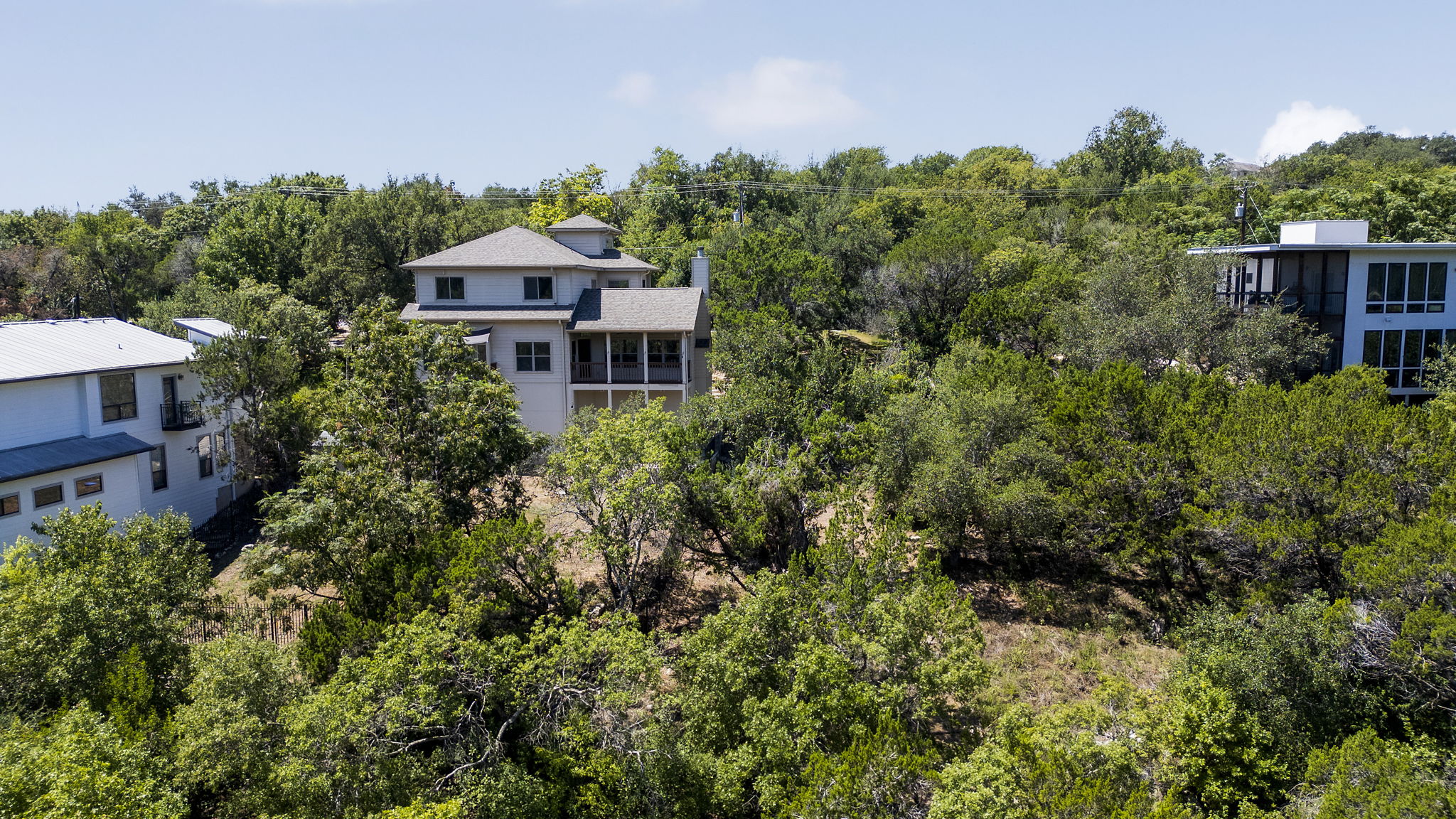 3013 Geronimo Trail Austin, TX 78734 - Photo 7 of 20 an aerial view of a house with a yard