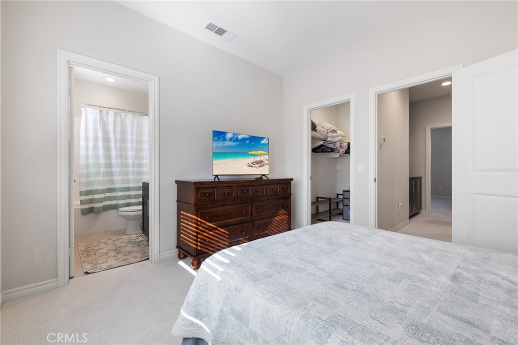 1200 Oliva Court Duarte, CA 91010 - Photo 20 of 40 a bedroom with a bed and a dresser