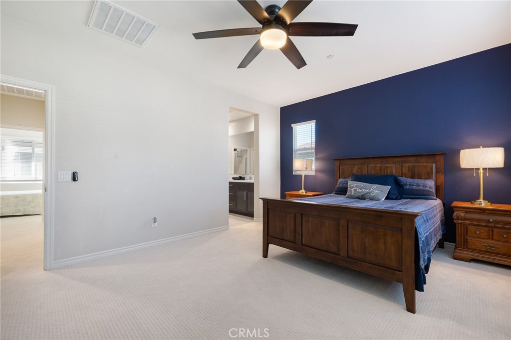 1200 Oliva Court Duarte, CA 91010 - Photo 23 of 40 a bed room with a bed and a ceiling fan