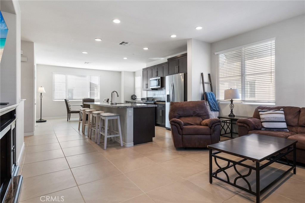 1200 Oliva Court Duarte, CA 91010 - Photo 3 of 40 a living room with stainless steel appliances furniture a window and a kitchen view