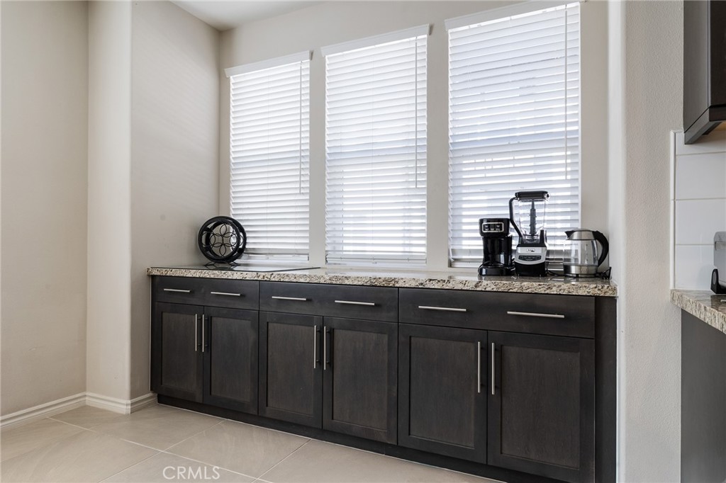 1200 Oliva Court Duarte, CA 91010 - Photo 8 of 40 a kitchen with a sink and cabinets