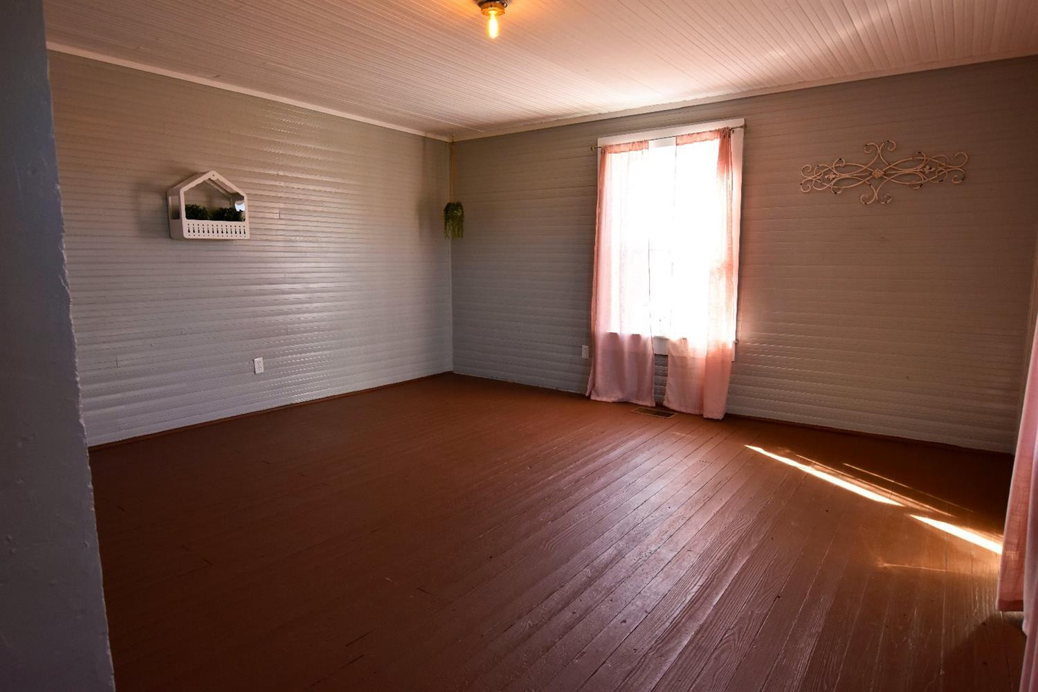 58 Parvin Road Irvine, KY 40336 - Photo 60 of 72 Large bedroom with solid wood walls, flo