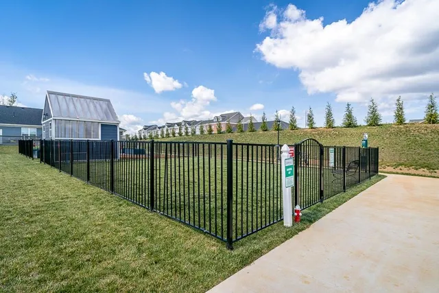 a view of a wrought iron fences in front of house