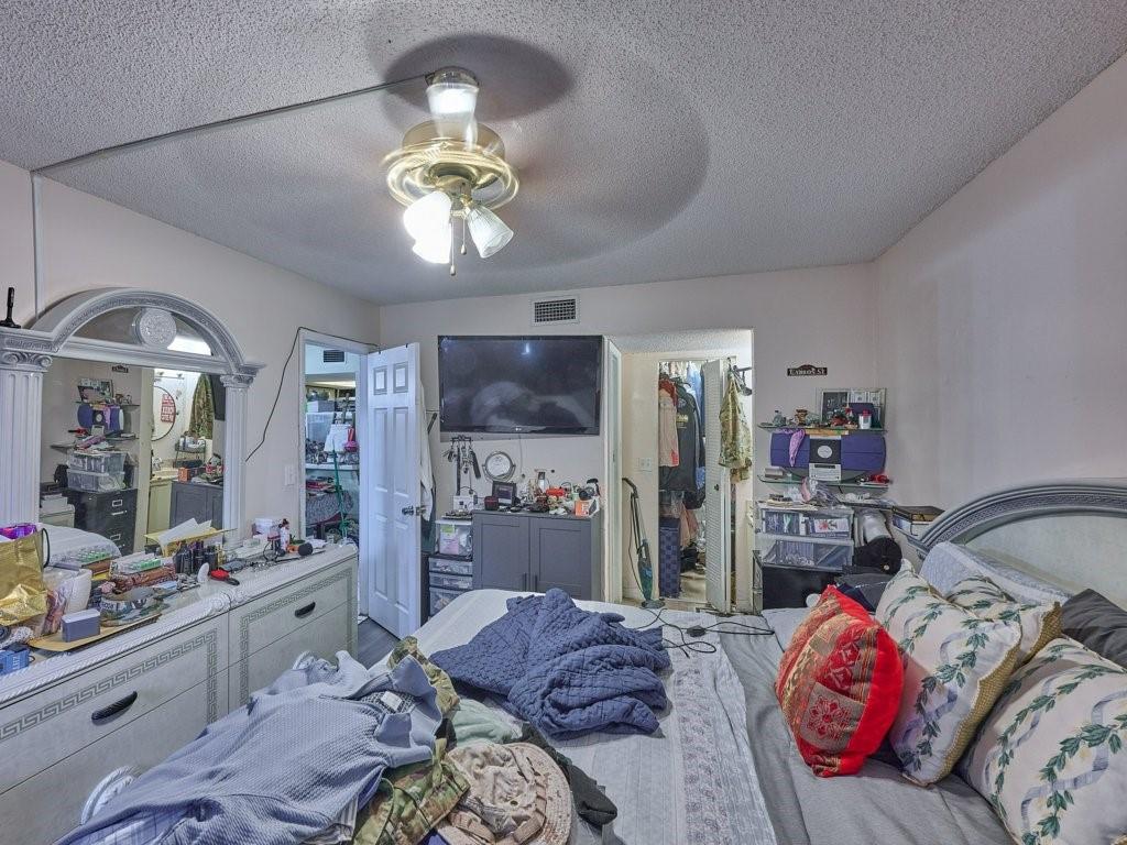 3253 Riverside Drive, Unit D301 Coral Springs, FL 33065 - Photo 24 of 29 a living room with furniture chandelier and a chandelier