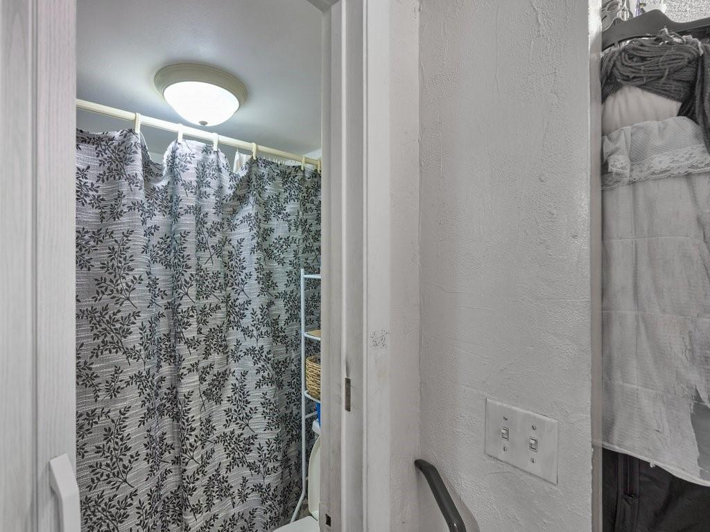 3253 Riverside Drive, Unit D301 Coral Springs, FL 33065 - Photo 26 of 29 a bathroom with a shower