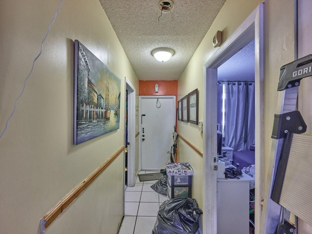 3253 Riverside Drive, Unit D301 Coral Springs, FL 33065 - Photo 8 of 29 a view of entryway with furniture