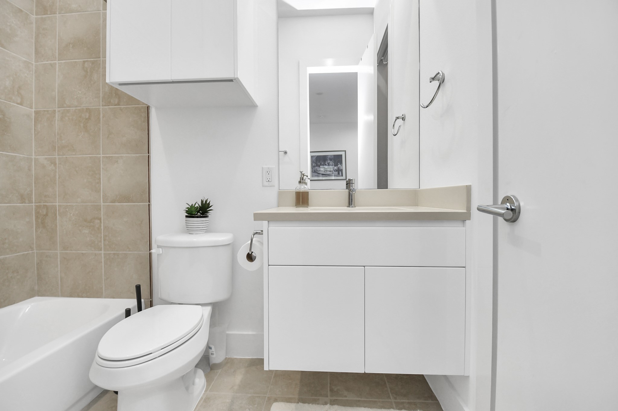 4722 Austin Street Houston, TX 77004 - Photo 28 of 38 Third en-suite bath with floating vanity and built-in storage!