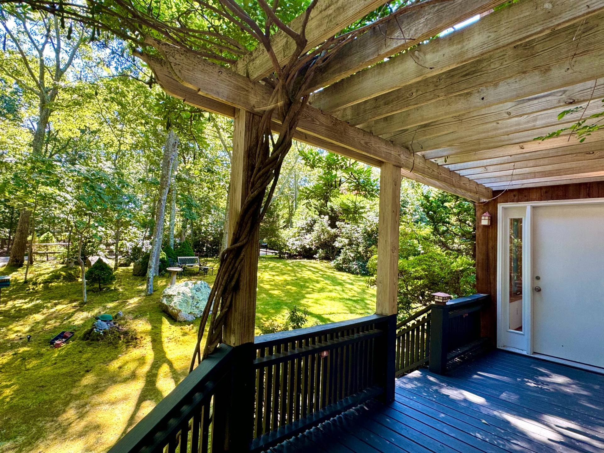 6 Eli Circle East Hampton, NY 11937 - Photo 22 of 29 a view of balcony with wooden floor