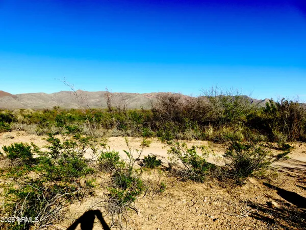 a view of lake and mountain