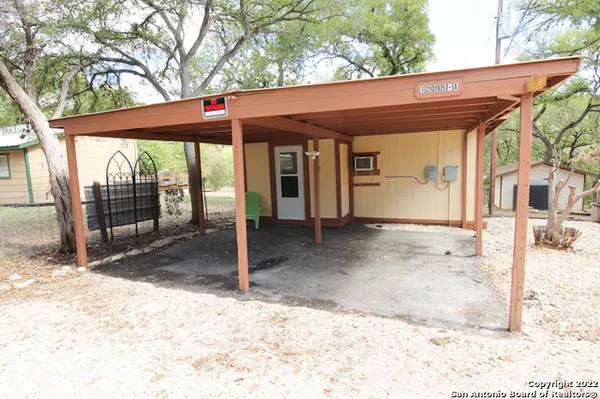 a view of a house with a patio