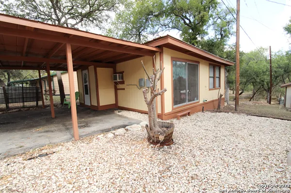a view of house with a outdoor space