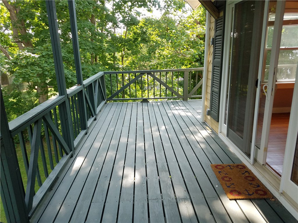 49 Merton Road, Unit 2 Newport, RI 02840 - Photo 35 of 42 Wrap around Porch overlooking back yard and sliders to Living Room