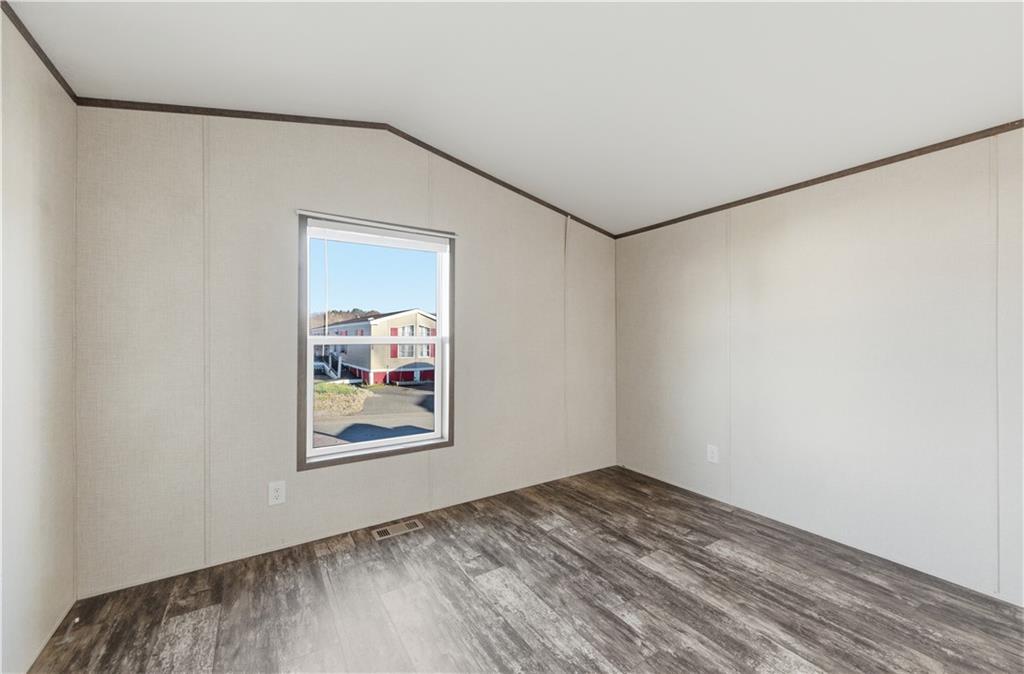 130 Brook Lane Valencia, PA 16059 - Photo 15 of 16 a view of a hallway with wooden floor and workspace