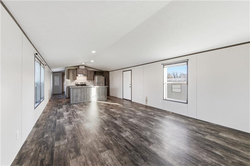130 Brook Lane Valencia, PA 16059 - Photo 6 of 16 a view of empty room with wooden floor