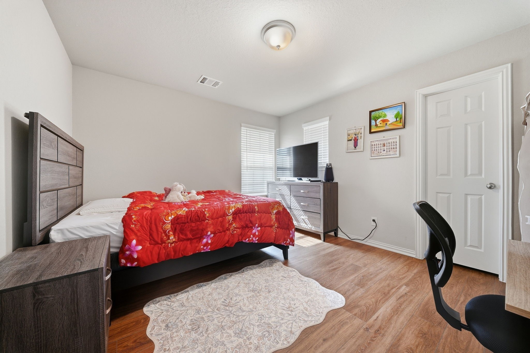 17714 Sugar Magnolia Lane Spring, TX 77379 - Photo 15 of 24 Additional bedroom with flooring throughout and a large closet.