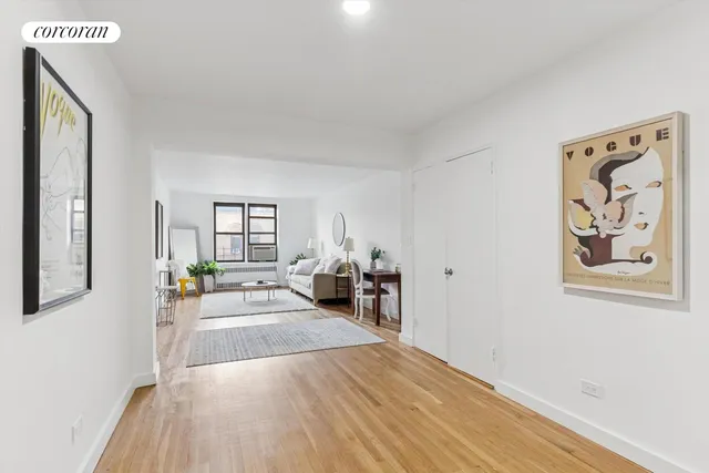 a kitchen with sink stove and cabinets