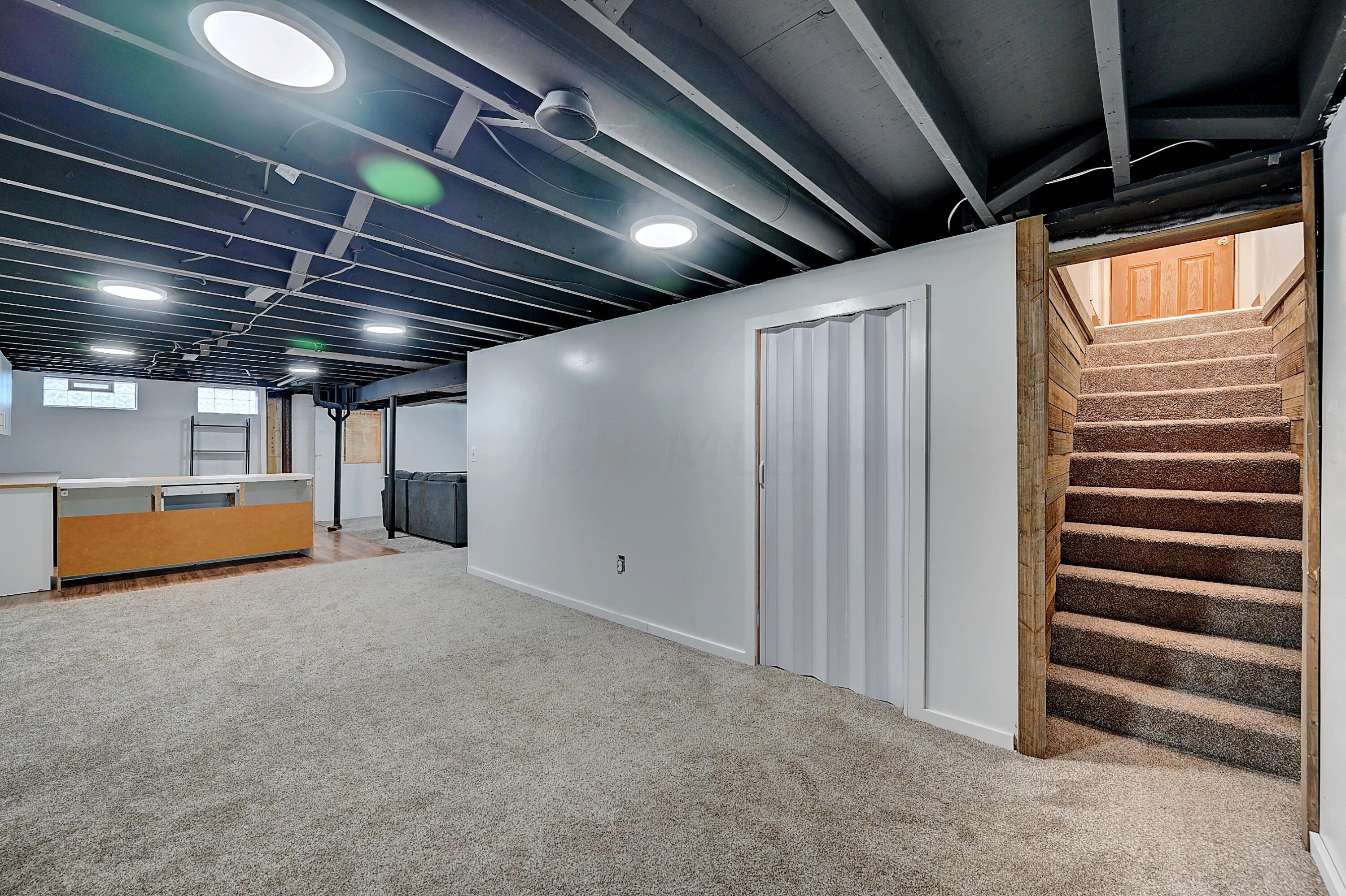 5594 Norcross Road Columbus, OH 43229 - Photo 22 of 33 Basement entertaining area