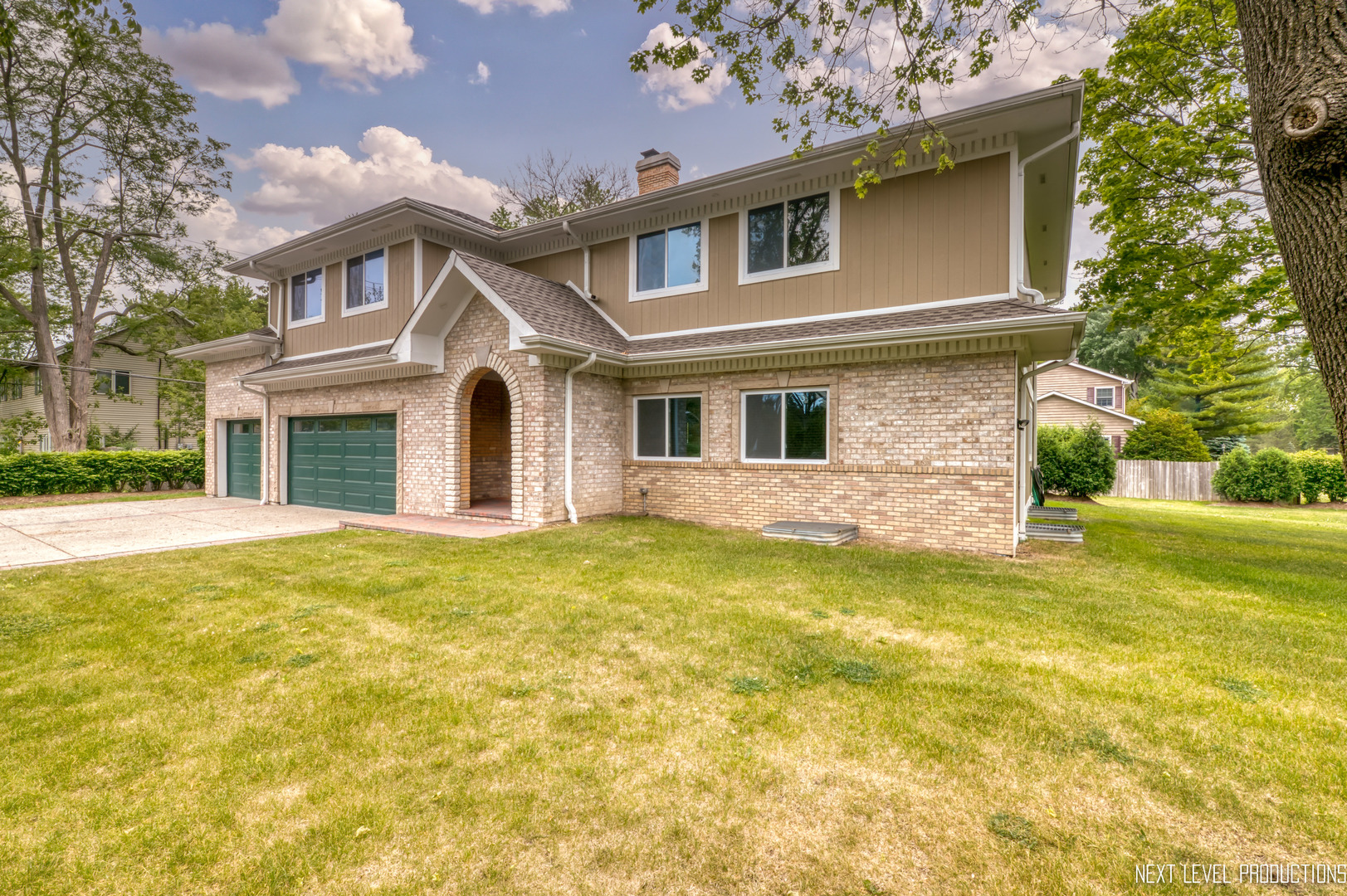 115 Birch Avenue Lake Bluff, IL 60044 - Photo 2 of 39 a front view of a house with swimming pool