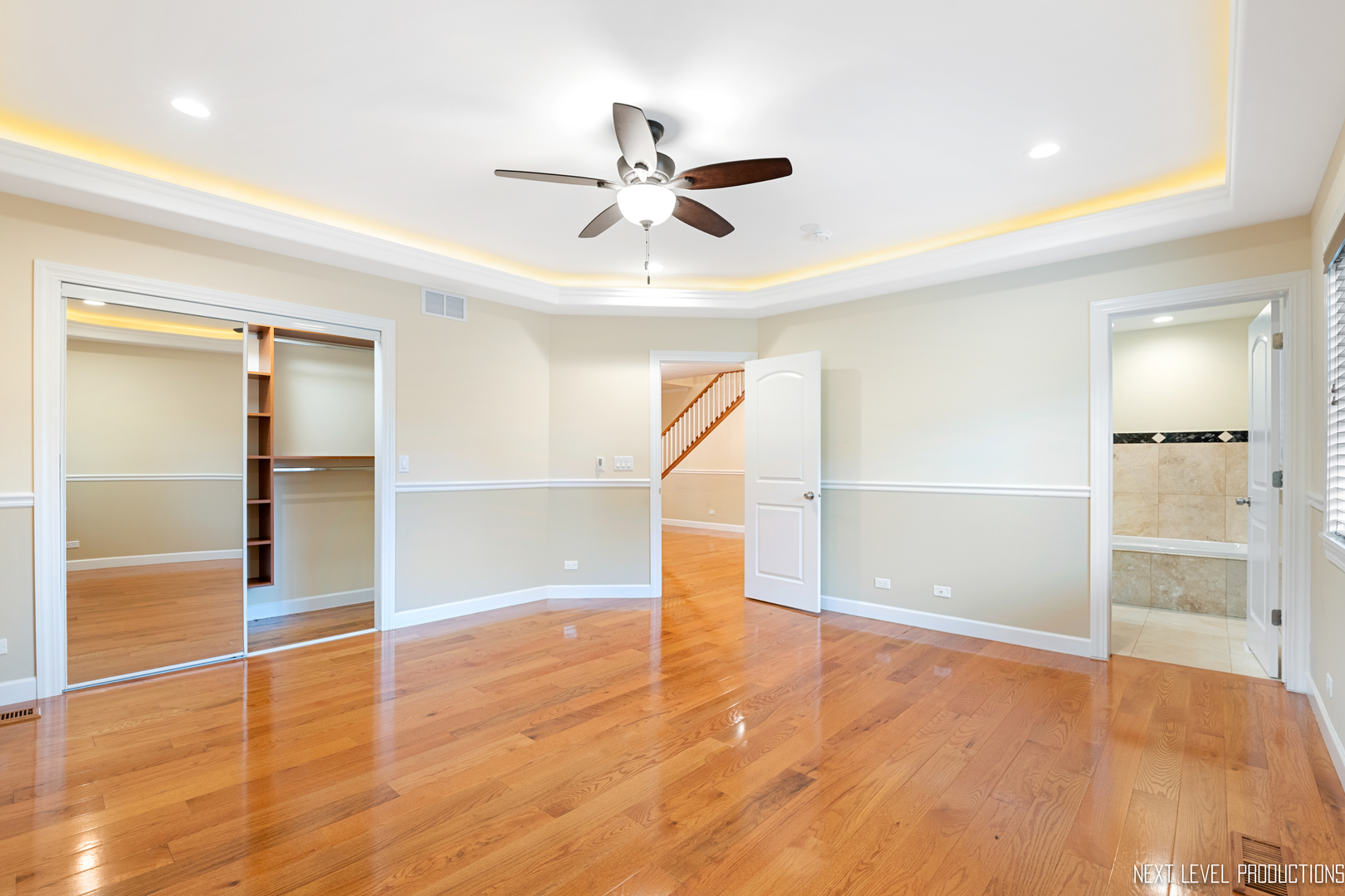 115 Birch Avenue Lake Bluff, IL 60044 - Photo 16 of 39 wooden floor in an empty room with a window