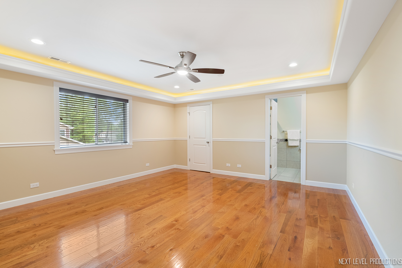 115 Birch Avenue Lake Bluff, IL 60044 - Photo 23 of 39 a view of empty room with wooden floor and fan