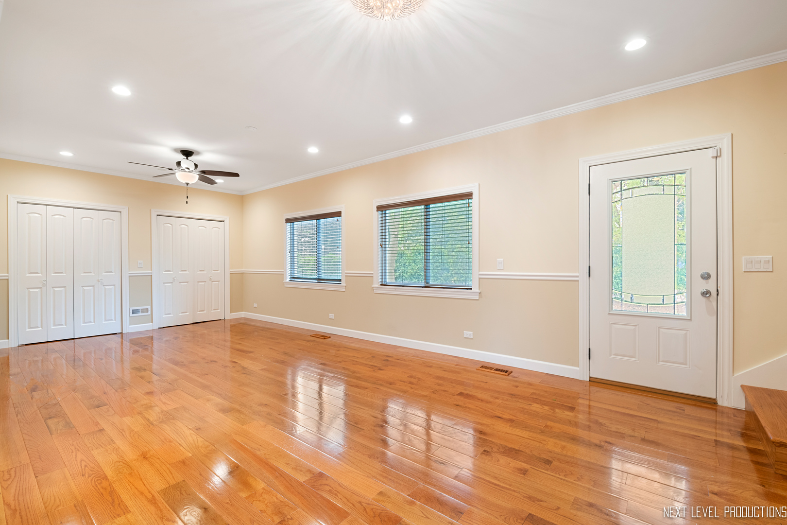 115 Birch Avenue Lake Bluff, IL 60044 - Photo 4 of 39 a view of an empty room with window and wooden floor