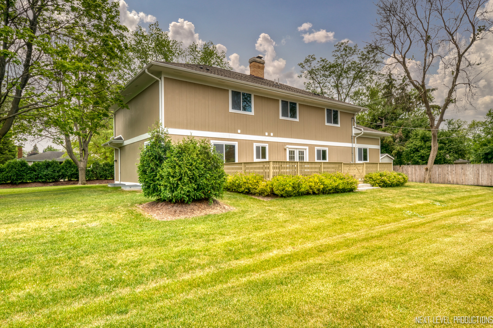 115 Birch Avenue Lake Bluff, IL 60044 - Photo 34 of 39 a front view of house with yard and swimming pool