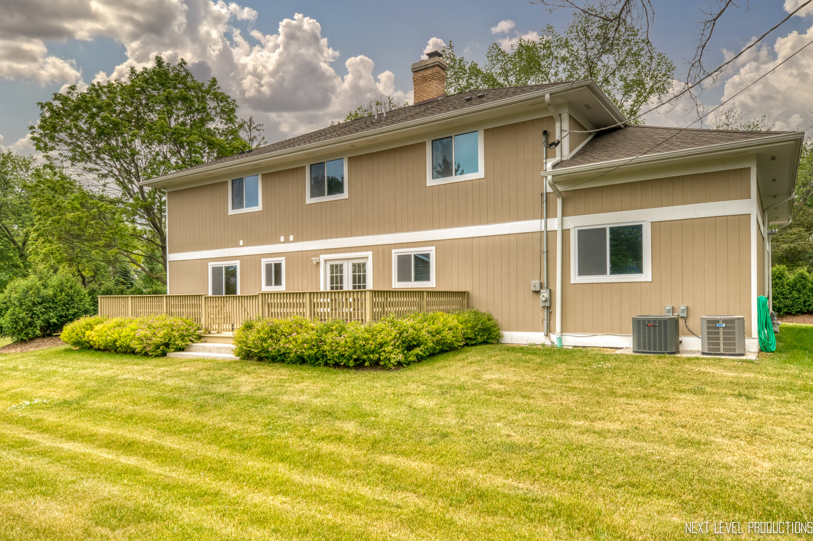 115 Birch Avenue Lake Bluff, IL 60044 - Photo 35 of 39 a front view of a house with a yard