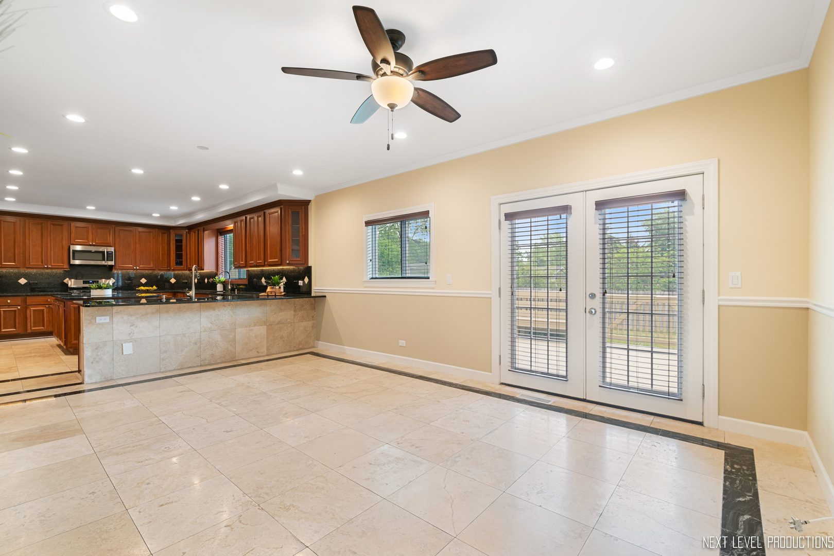115 Birch Avenue Lake Bluff, IL 60044 - Photo 7 of 39 a view of a kitchen with furniture and a large window