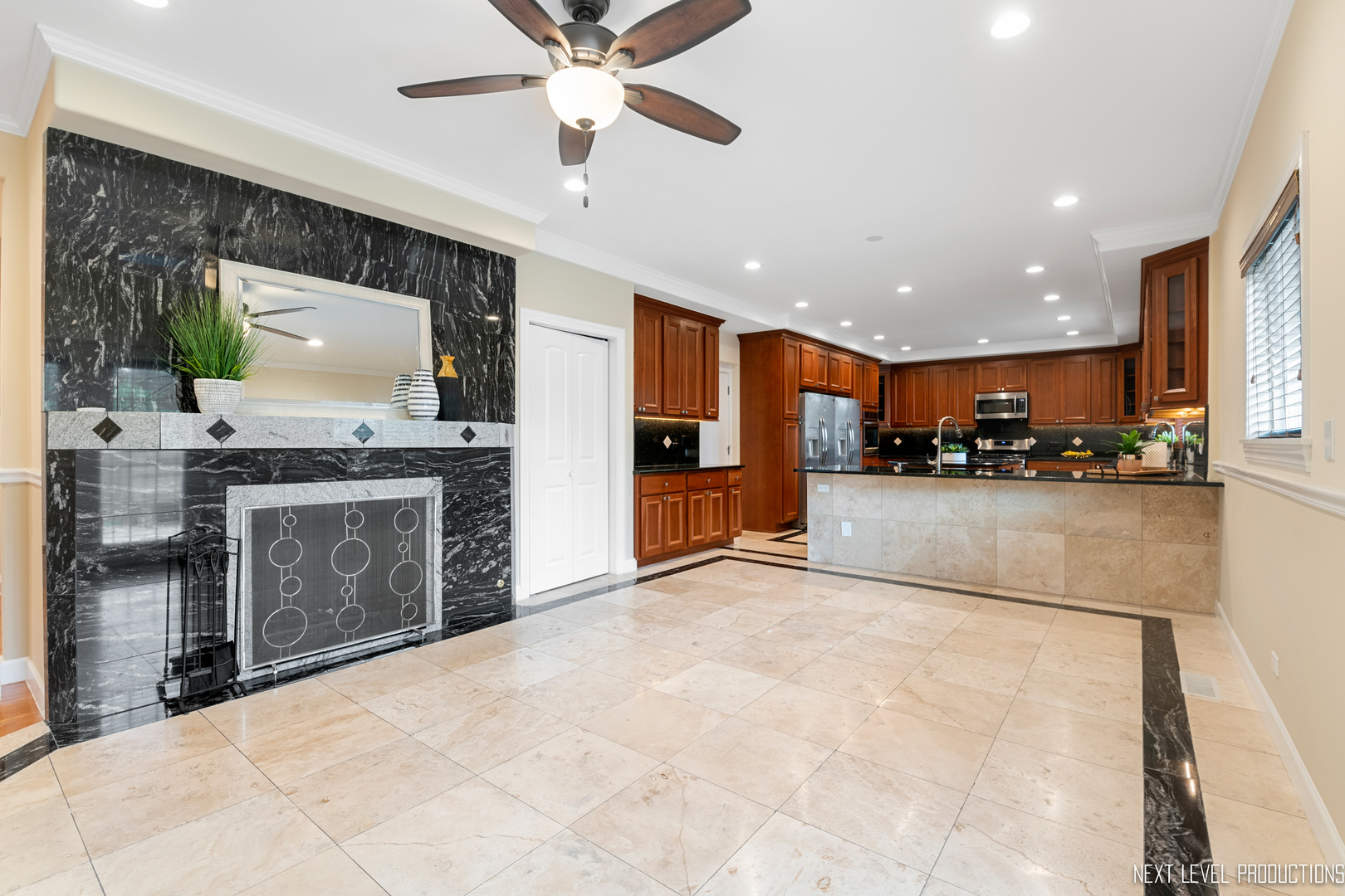 115 Birch Avenue Lake Bluff, IL 60044 - Photo 8 of 39 a view of a kitchen with a sink and a stove top oven