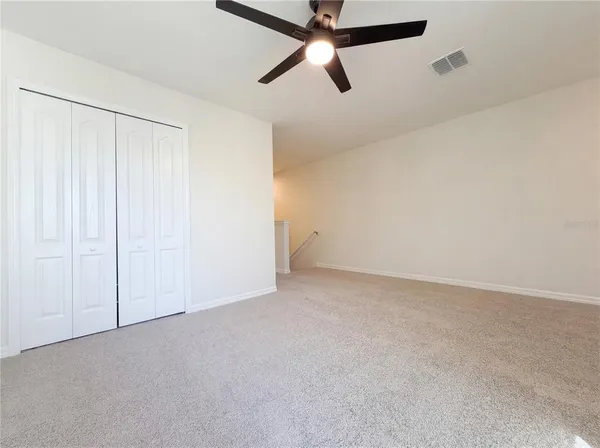 an empty room with closet