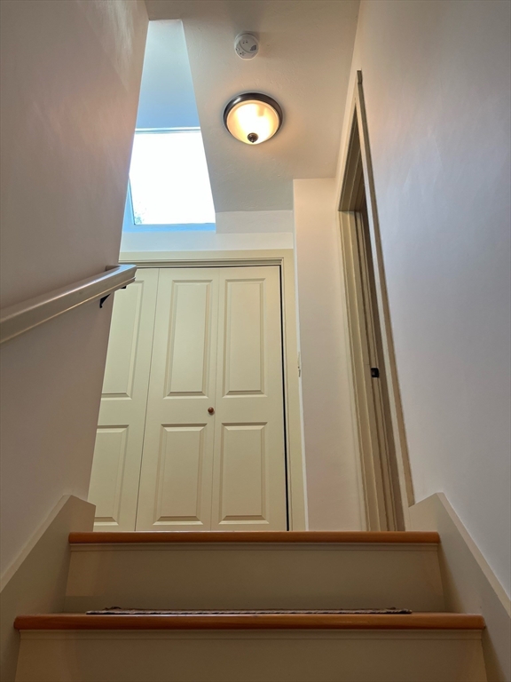 160 Quaker Street Northbridge, MA 01534 - Photo 12 of 36 an view of staircase with white walls