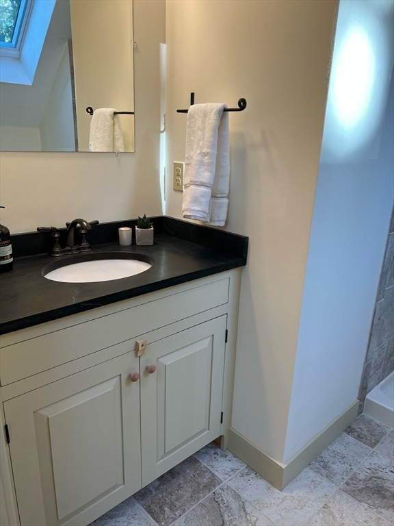 160 Quaker Street Northbridge, MA 01534 - Photo 17 of 36 a bathroom with a sink and a mirror
