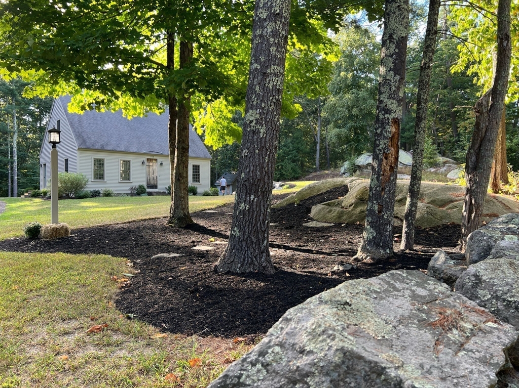 160 Quaker Street Northbridge, MA 01534 - Photo 2 of 36 a view of a tree in front of a house