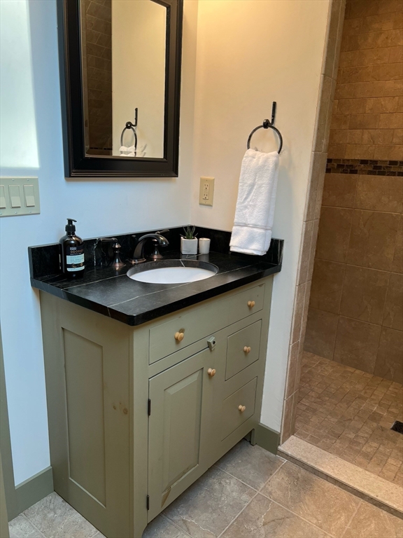 160 Quaker Street Northbridge, MA 01534 - Photo 23 of 36 a bathroom with a granite countertop sink and a mirror
