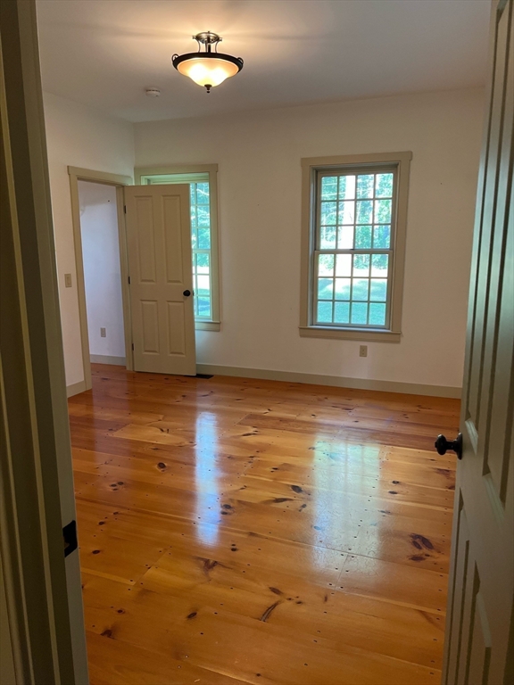 160 Quaker Street Northbridge, MA 01534 - Photo 8 of 36 wooden floor in an empty room with a window