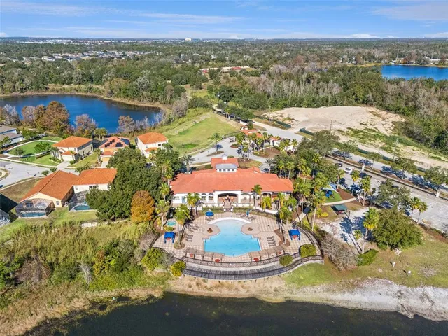 a view of a swimming pool with a patio