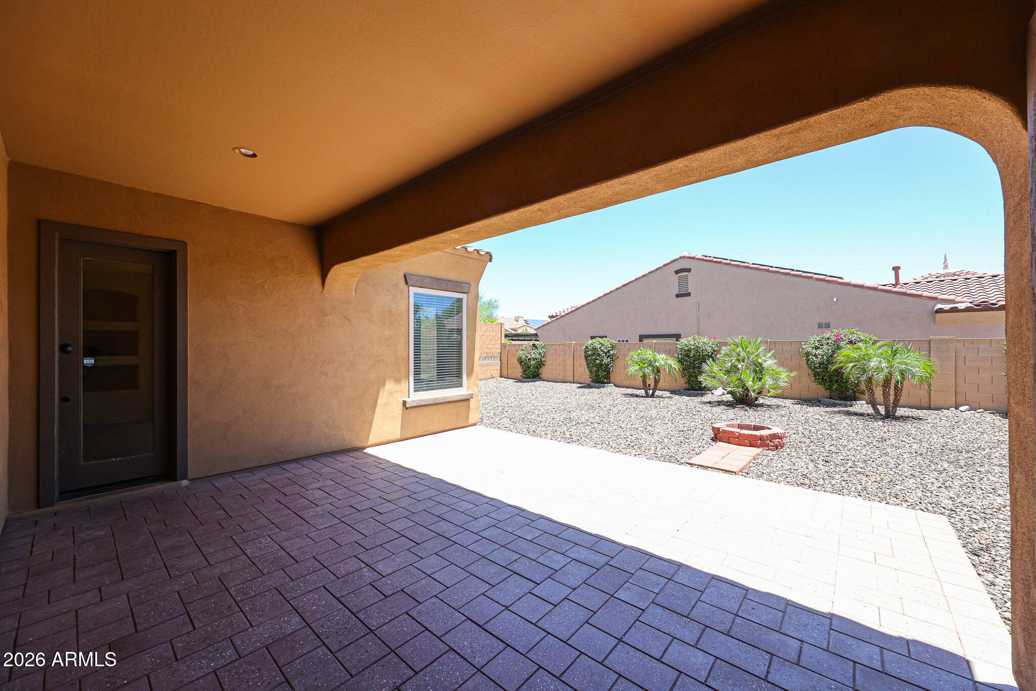 18175 West Narramore Road Goodyear, AZ 85338 - Photo 36 of 72 a house view with a outdoor space