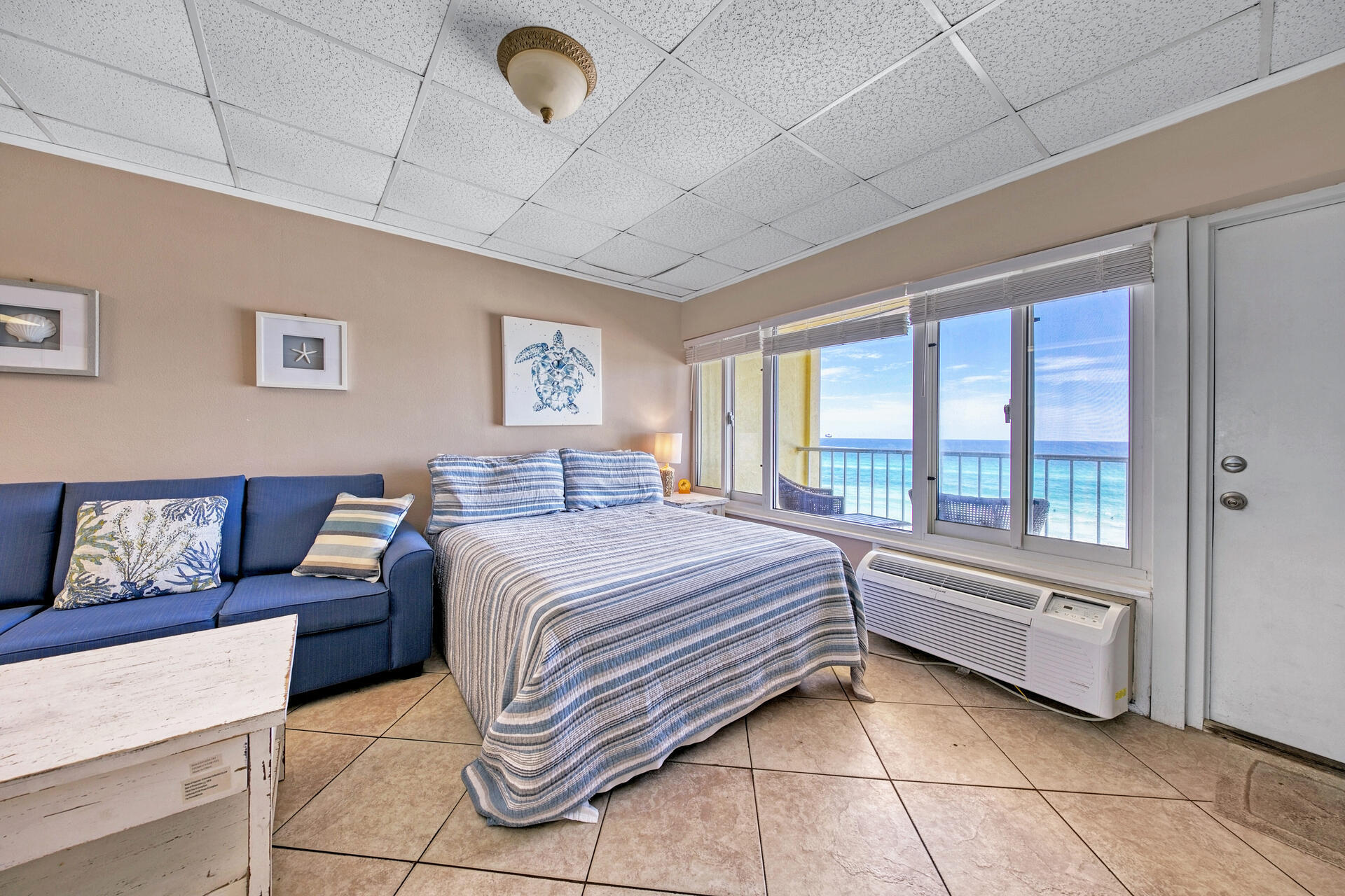 15413 Front Beach Road, Unit 505 Panama City Beach, FL 32413 - Photo 12 of 28 a bedroom with a bed and a large window