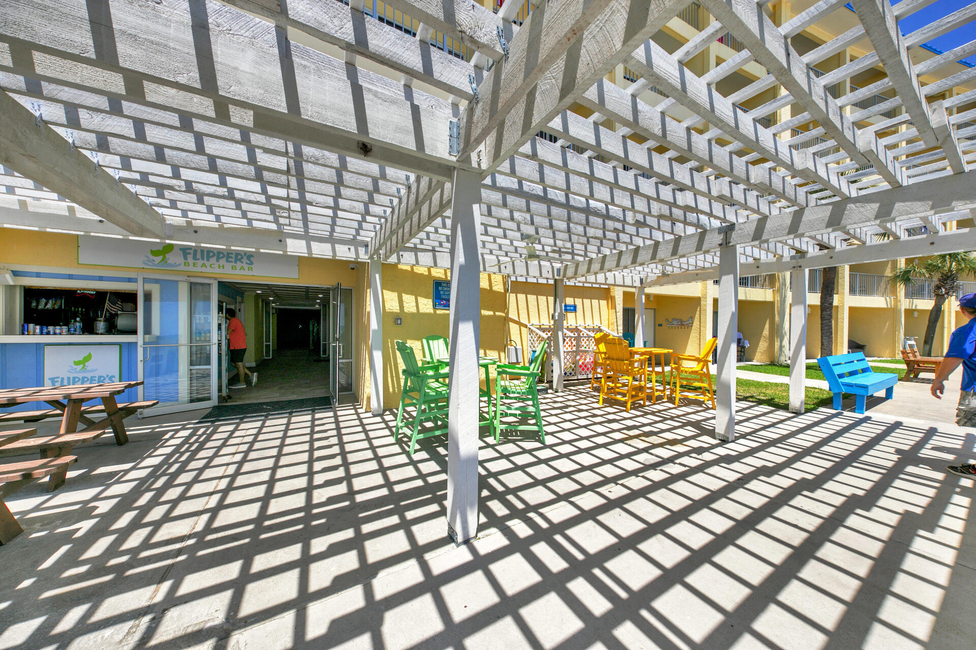 15413 Front Beach Road, Unit 505 Panama City Beach, FL 32413 - Photo 23 of 28 a view of a porch with furniture