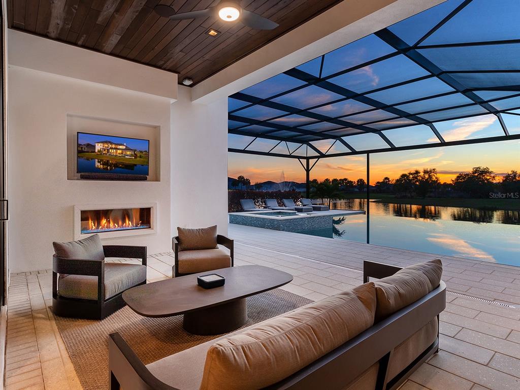 4218 Butte Trail Lakewood Ranch, FL 34211 - Photo 68 of 89 a outdoor living space with furniture